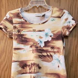 Beautiful, tropical, short sleeve blouse in browns, white and turquoise.